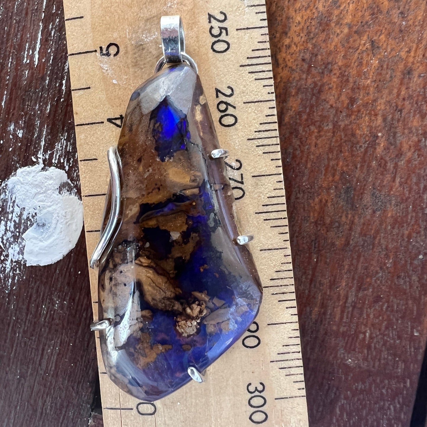 A wonderful example of Winton Boulder opal. Great shape and colours. Mounted on custom made silver. A lovely piece.
