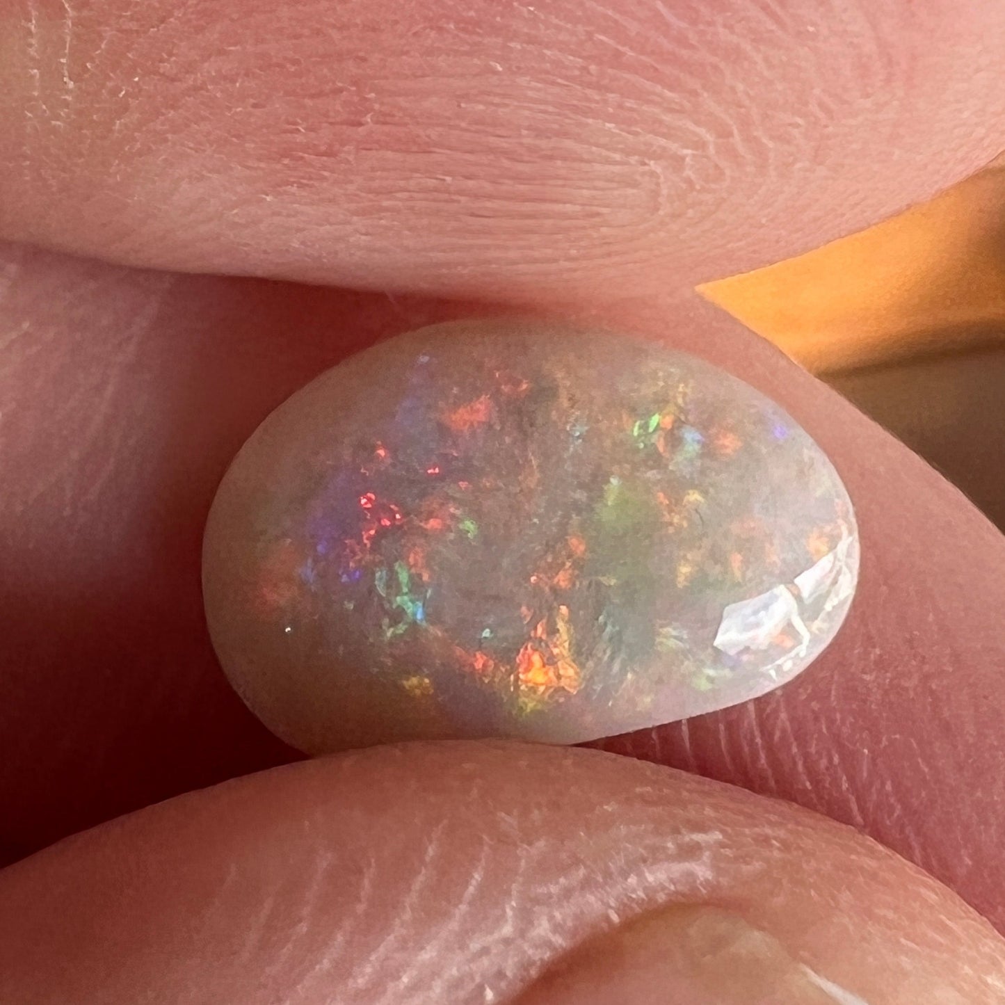 Lightning Ridge solid semi black opal. Awesome play of colours and beautifully polished.