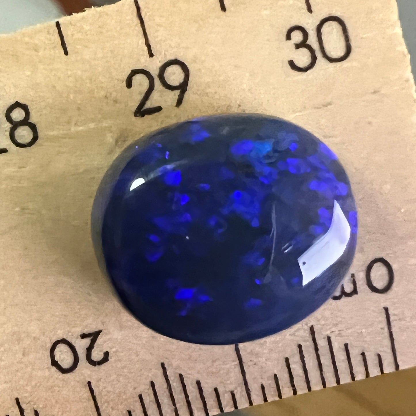 Beautiful blue on black Lightning Ridge solid opal. Rough originally supplied by the Tunnel Rats, and the precious gem supplied to us by Phoenix Opals.