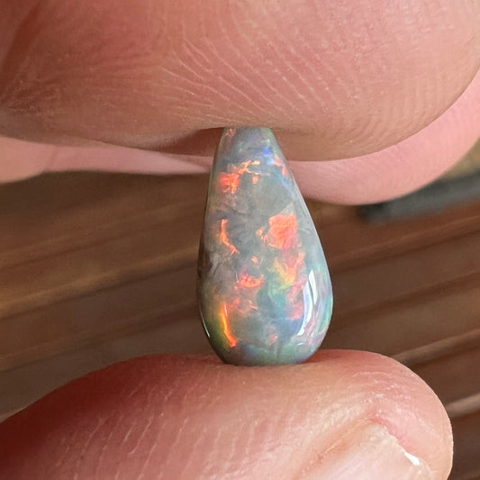 Rare Mintabie solid black opal. A perfect specimen displaying an impressive play of colour. Ready for that special person.