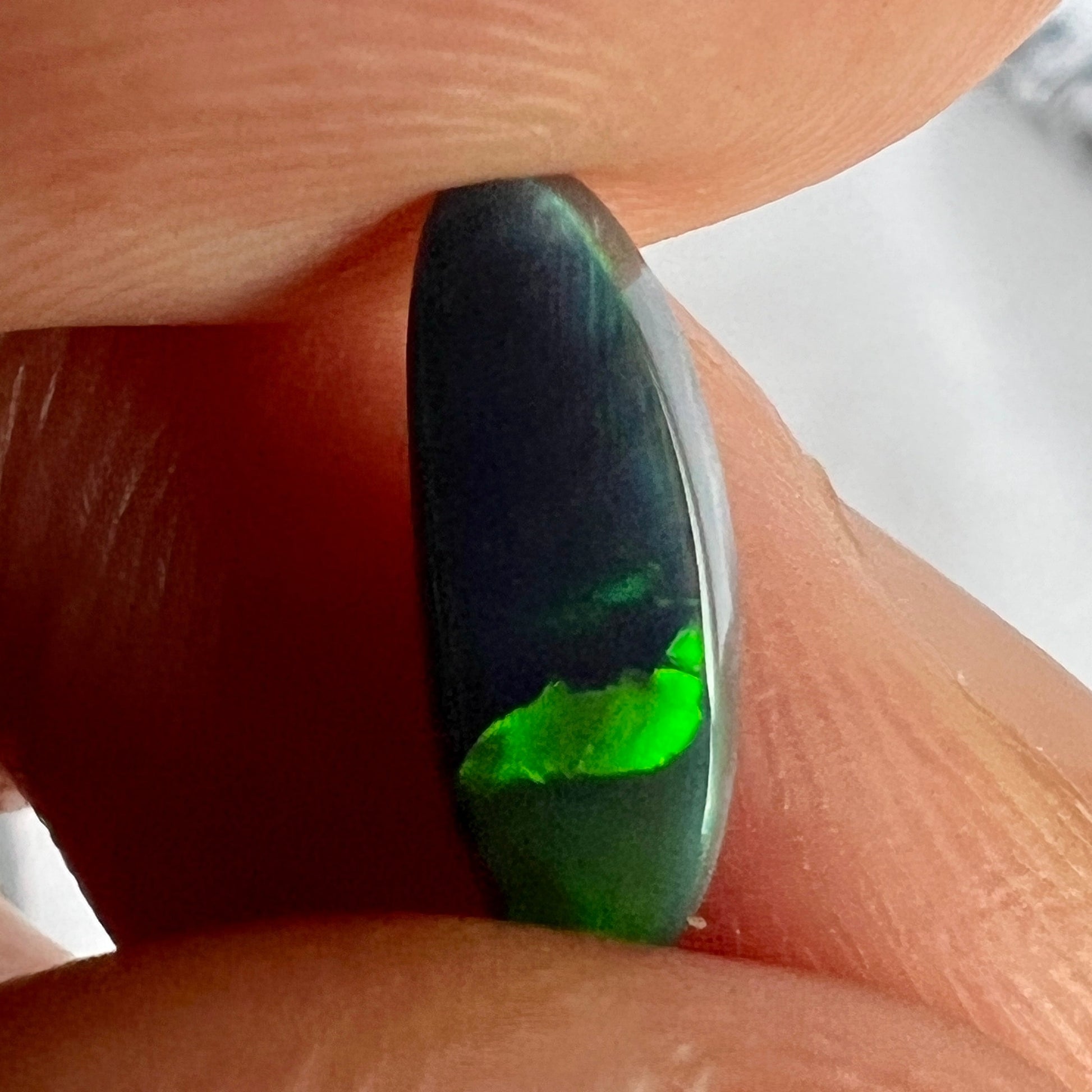 Lightning Ridge solid black opal with wonderful greens. Would make a beautiful ring.