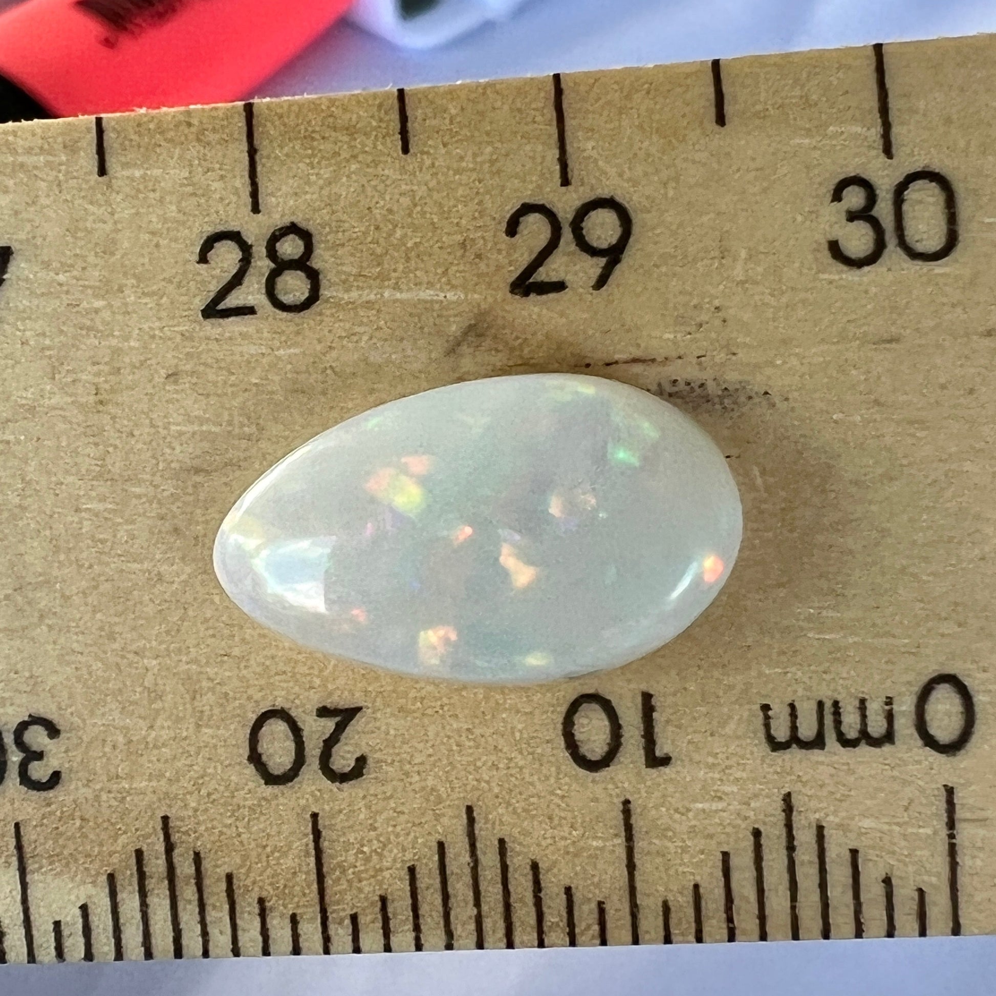 Stunning Coober Pedy opal displaying wonderful colours. Beautifully cut and polished, ready to set.