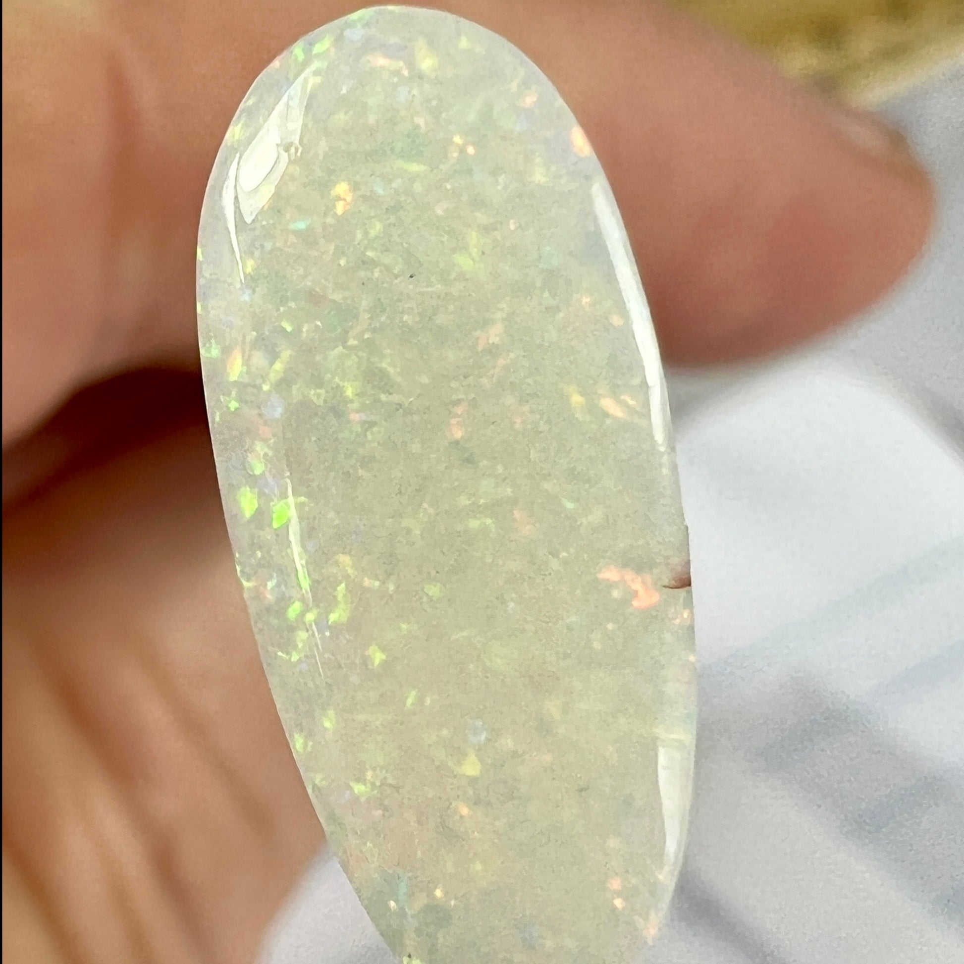 Coober Pedy pin fire opal. A nice shape and a beautiful finish. Both sides slight inclusion therefore priced at just $90.