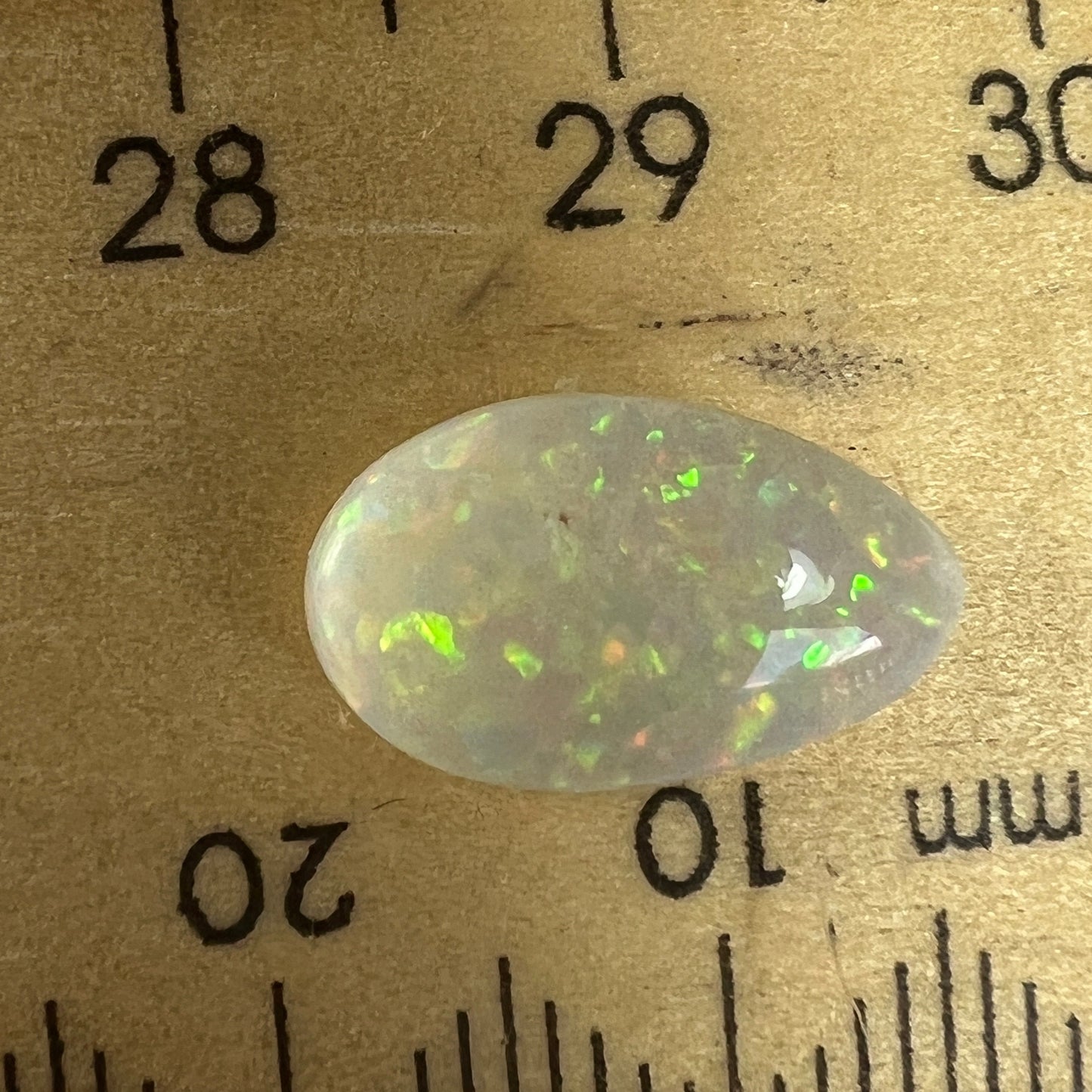 Lightning Ridge semi crystal opal. A beautiful stone ready to set, displaying beautiful colours.