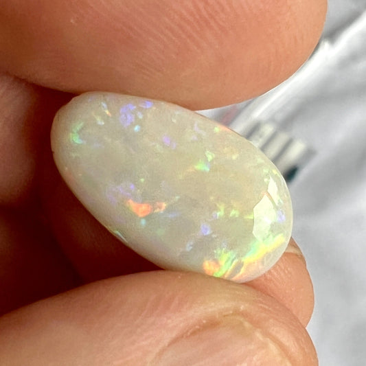 This awesome stone is cut and polished to perfection. From the outback opal mines of Grawin, near Lightning Ridge. Displaying a multitude of beautiful colours.