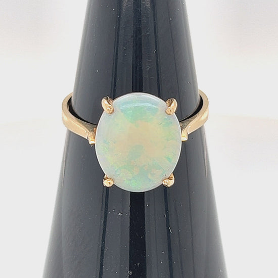 Stylish simple 14ct gold and opal ring. Great greens in this Coober Pedy crystal opal.