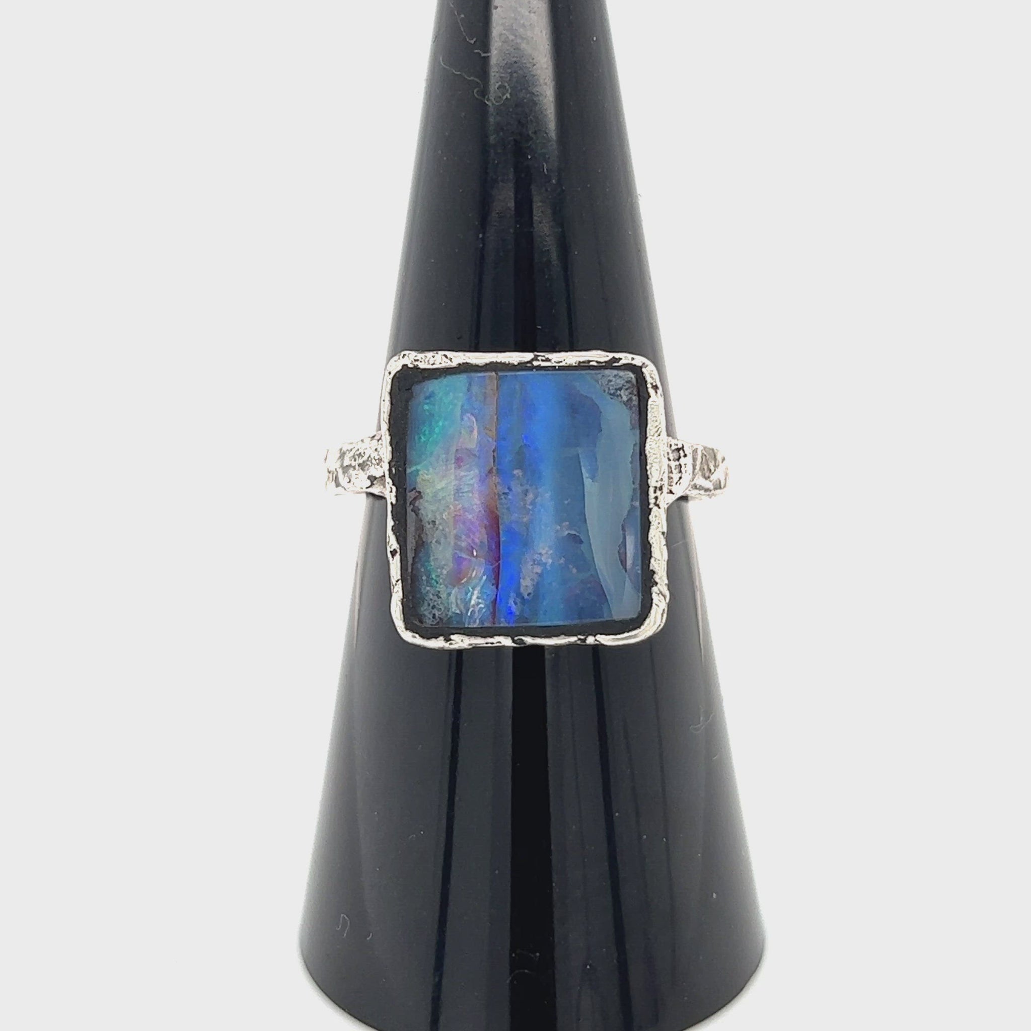 Beautiful square cut Queensland Boulder opal displaying impressive colours. Hand crafted by our talented Queensland Silversmith using Argentium silver.