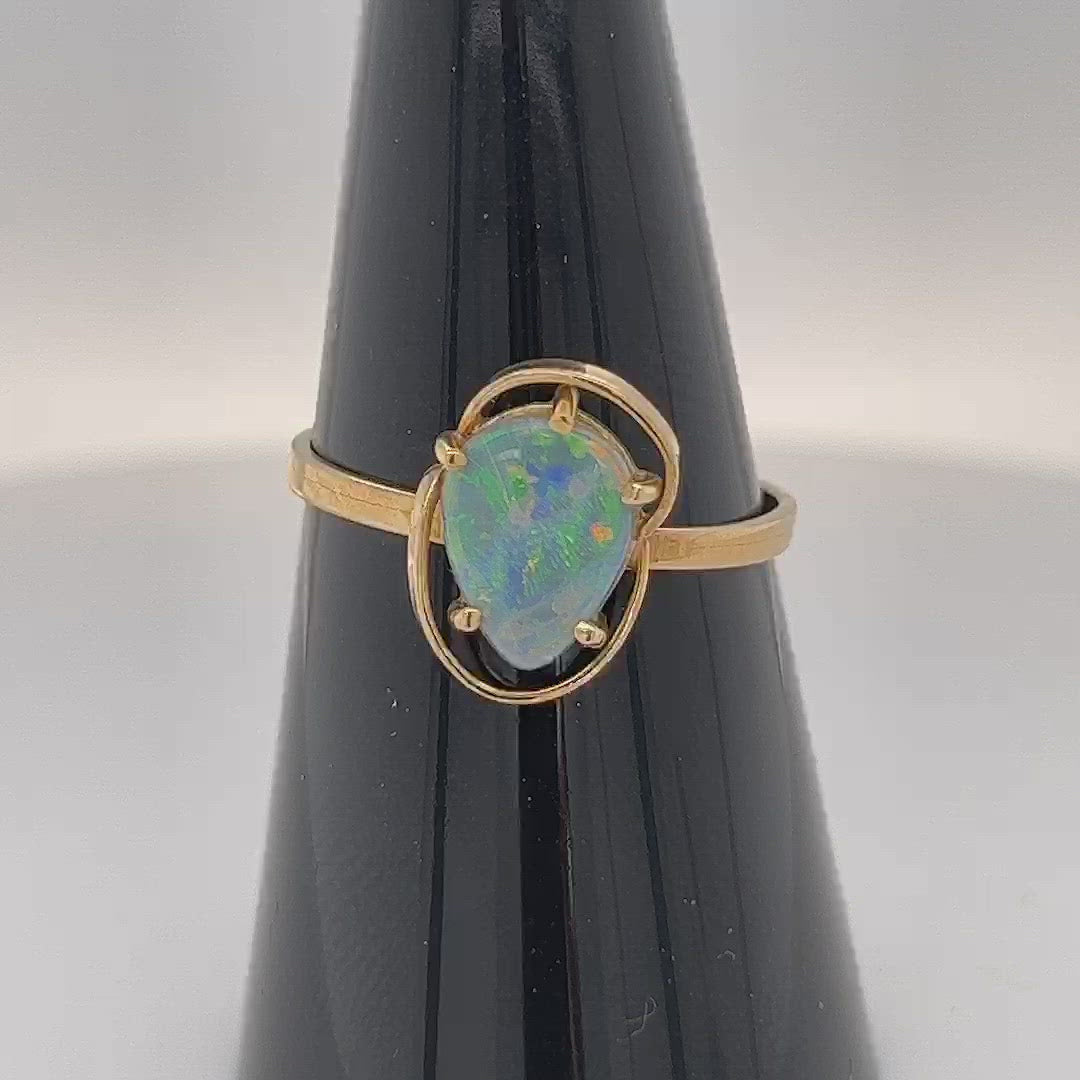 Great bespoke 14ct gold ring with an awesome Coober Pedy crystal opal showing fantastic colours.