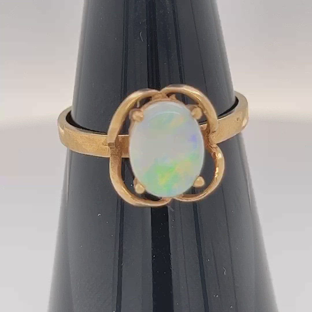 Very pretty one-off ring. Beautiful setting with an immaculate Coober Pedy crystal opal showing magnificent colours.