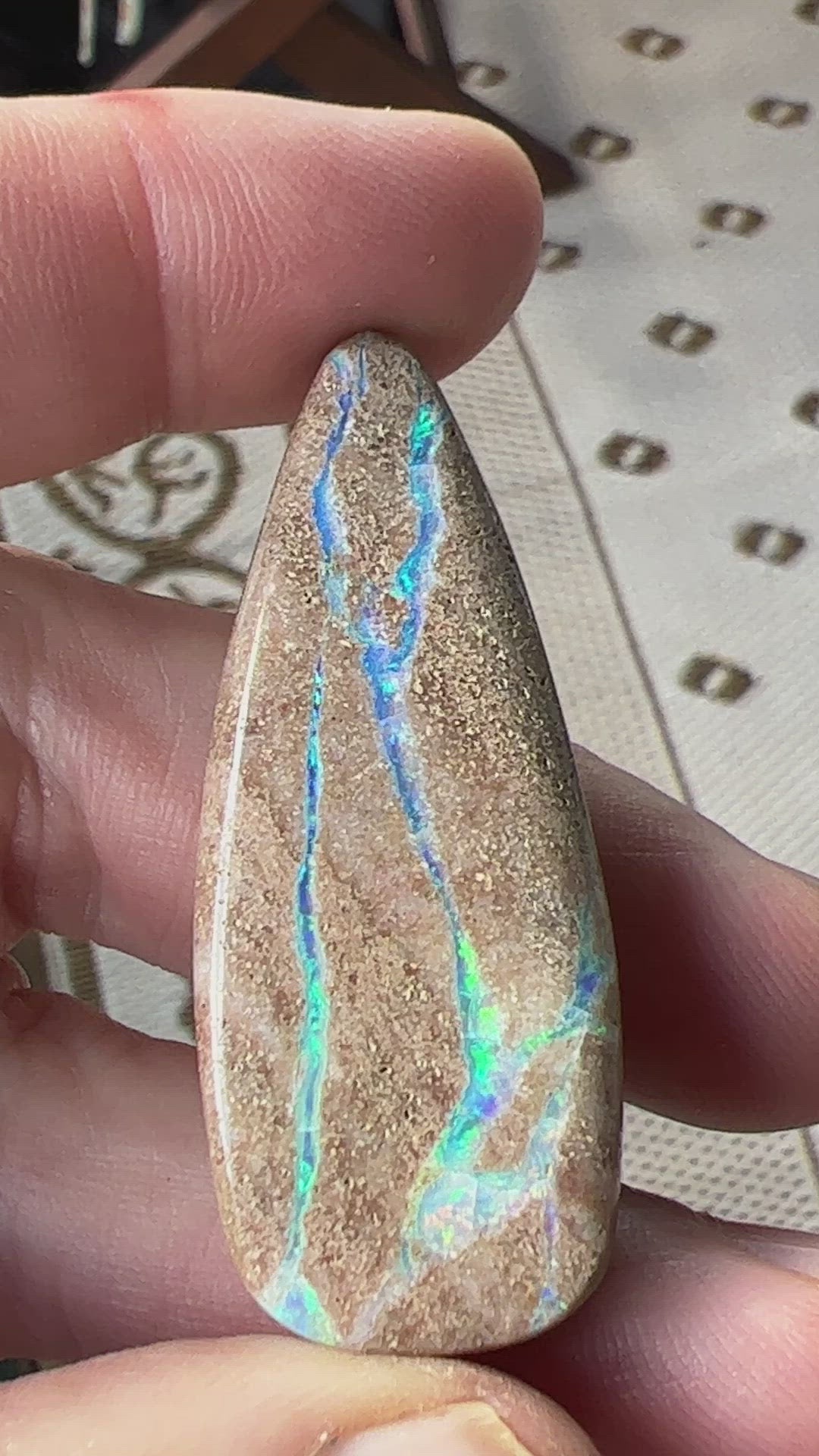 Rare Andamooka cap rock opal. Beautiful aqua and green coloured lines throughout. Would make a statement piece pendant.