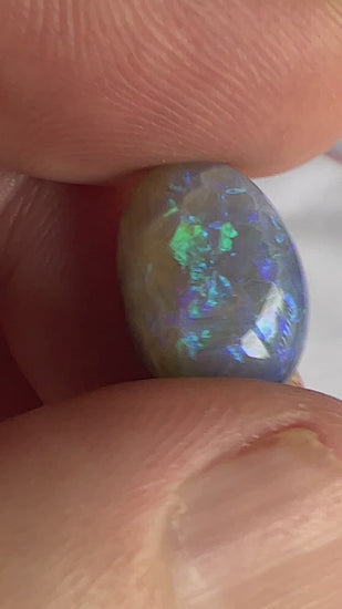 Beautiful Boulder Opal from the outback mining town of Quilpie, displaying stunning turquoise blues and purples. Great stone with a little sand on one end, hence the price.