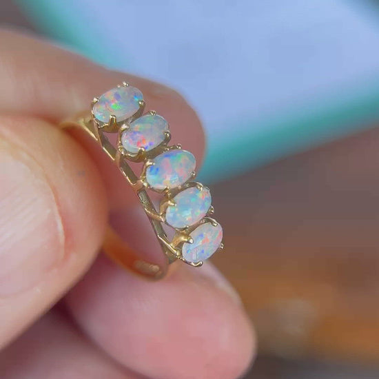 Five perfectly cut opals from Coober Pedy set into a 14ct gold ring. Beautiful matching colours. A truly beautiful ring.